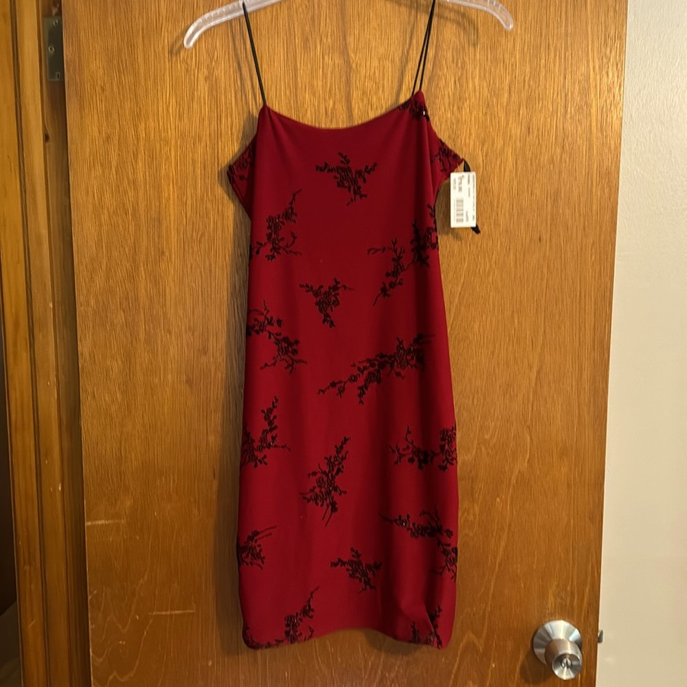 Short spaghetti dress with detailed sequins
